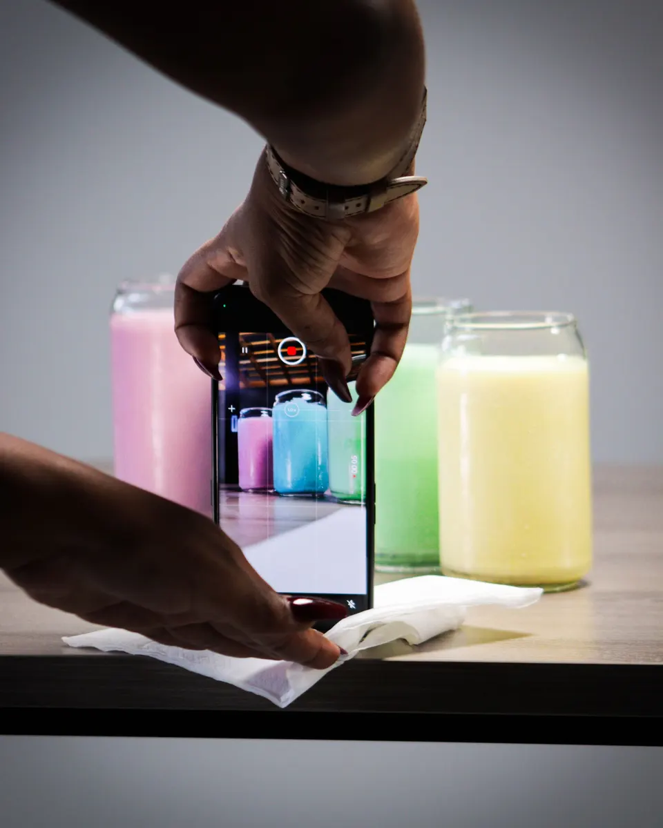 Hands filming a product on a phone